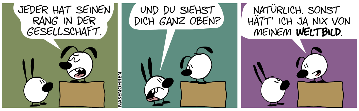 Eumel steht auf einer erhöhten Plattform und redet zu Mimi: „Jeder hat seinen Rang in der Gesellschaft.“ / Mimi: „Und du siehst dich ganz oben?“ / Eumel. „Natürlich. Sonst hätt’ ich ja nix von meinem Weltbild.“