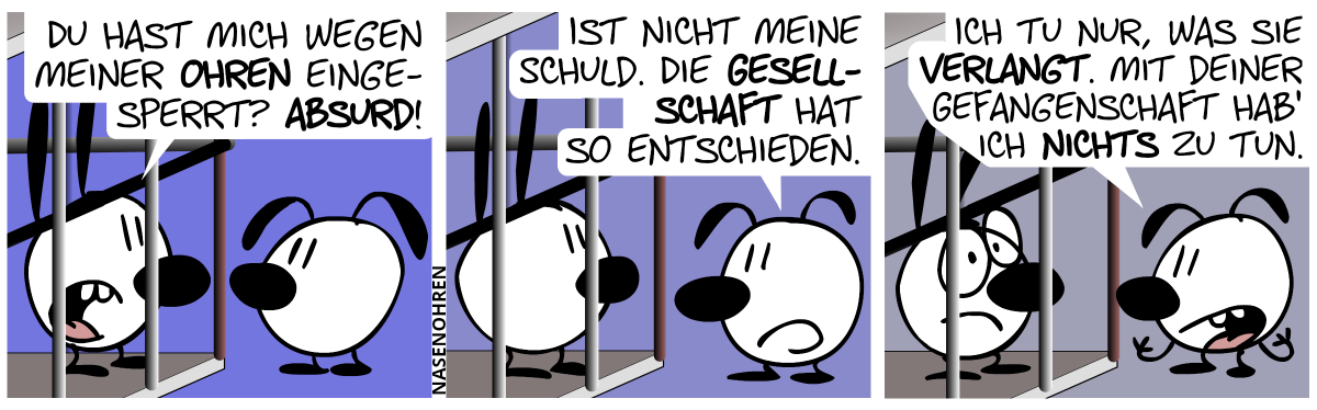 Mimi ist in einer Gefängniszelle, Eumel steht draußen. Mimi: „Du hast mich wegen meiner Ohren eingesperrt? Absurd!“ / Eumel: „Ist nicht meine Schuld. Die Gesellschaft hat so entschieden.“ / „Ich tu nur, was sie verlangt. Mit deiner Gefangenschaft hab ich nichts zu tun.“