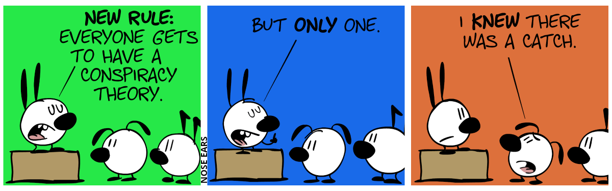 Mimi stands on a box and speaks to an audience (in which Eunice and Keno can be seen): “New rule: Everyone gets to make one conspiracy theory.” / “But only one.” / Eunice protests: “I knew there was a catch.”